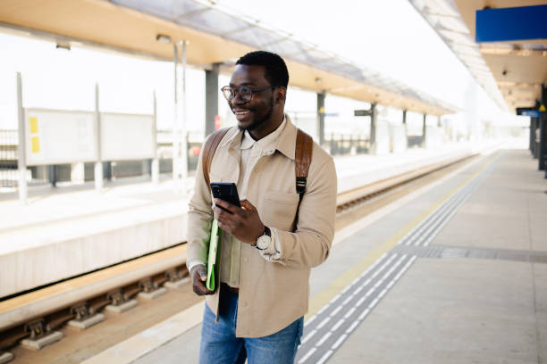 istock Young man is waiting for a train 1488438535