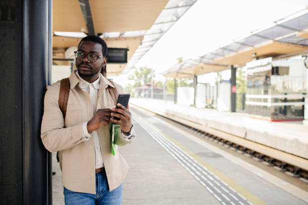 istock Young man is waiting for a train 1488438650