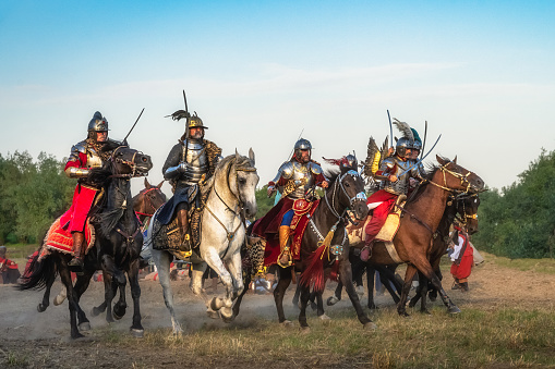 Gniew, Poland, Aug 2020 Polish Hussars, heavy cavalry, galloping through battlefield, historical reenactment of Battle of Gniew, Polish Swedish war