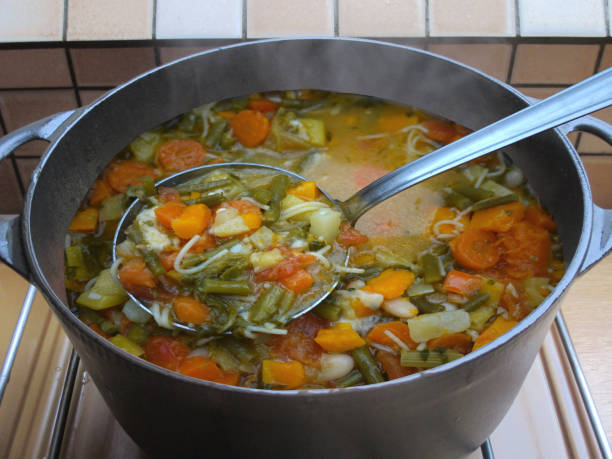 istock Pistou soup cooking in a cast iron pot ready to serve 1488441582