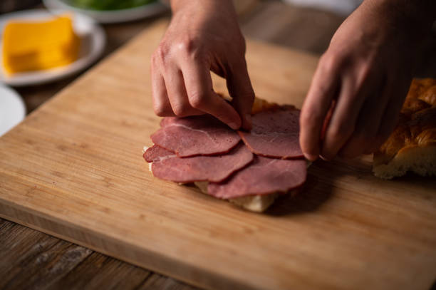 istock A male chef preparing a sandwich 1488442457