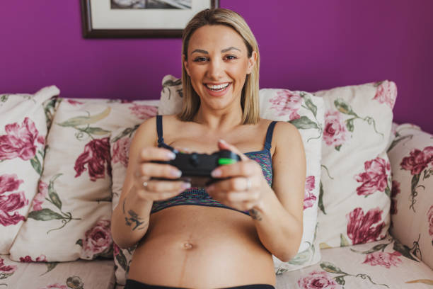 istock Pregnant woman gaming 1488442725