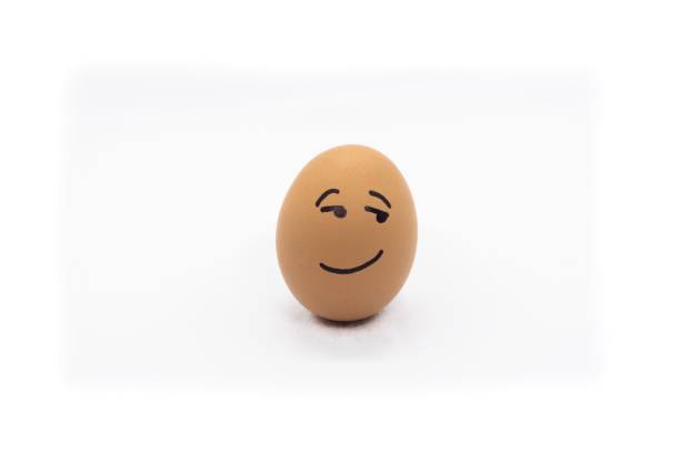 istock an egg with a drawn chill face isolated on a white background 1488444682