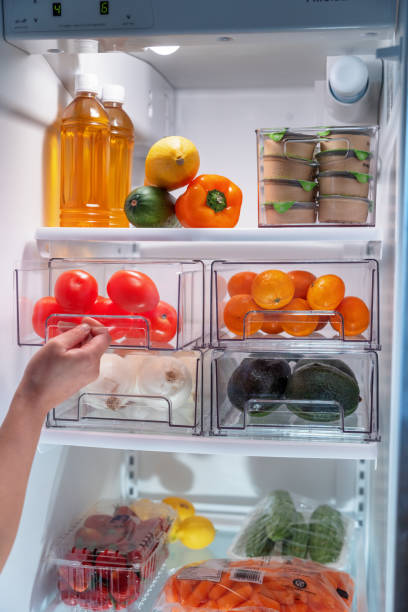 istock Open fridge of food items 1488445000