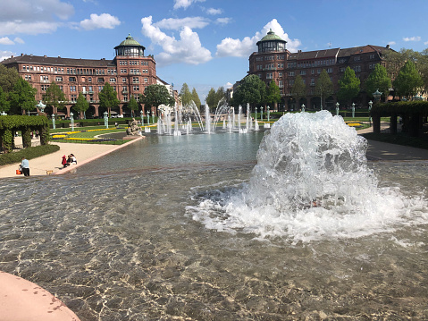 fountains in the park at the water tower of Mannheim in Germany at 05.02.2023