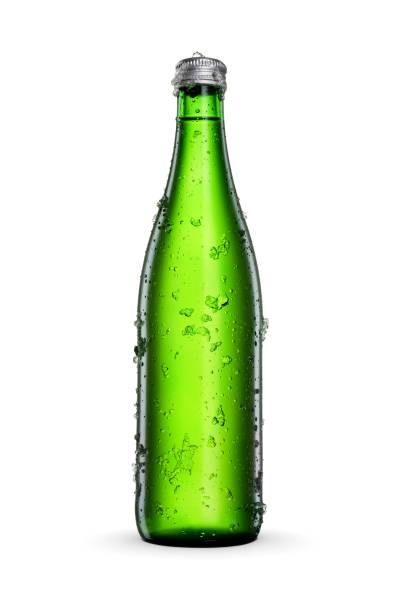 istock Beer in a green bottle isolated on white background. 1488446365