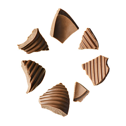 Piece of chocolate or chips isolated on white background with clipping path.