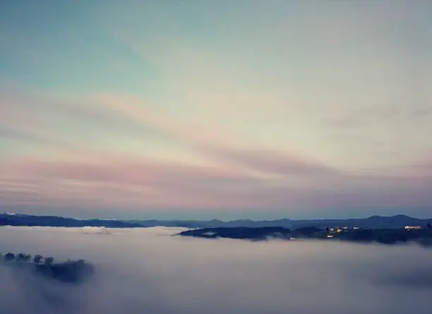 photo of the town of Tineo between the clouds