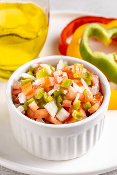 Vinaigrette in ramekin on the table.