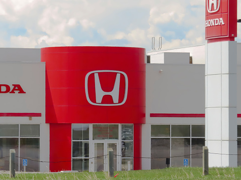 Okotocks, Alberta, Canada. May 7, 2023. A Honda store car dealership.