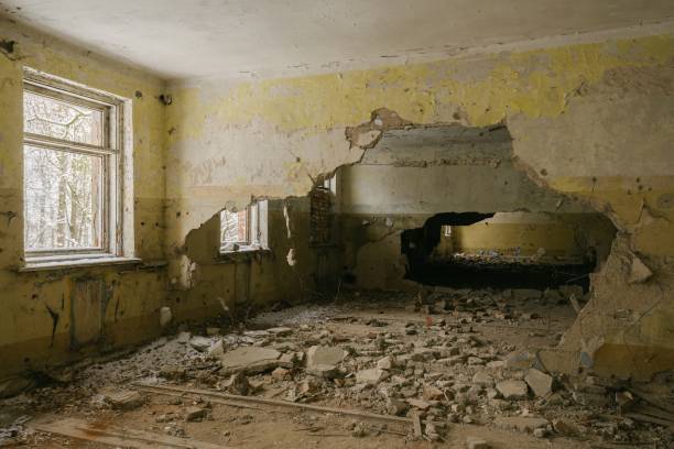 istock broken wall in an abandoned room 1488464660