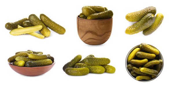 Set with tasty pickled cucumbers on white background. Banner design
