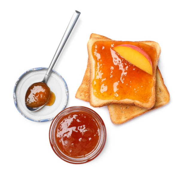 deliziosi toast con marmellata isolata su bianco, vista dall'alto - dessert grilled peaches peach foto e immagini stock