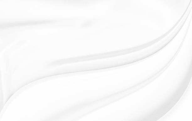 istock White gray satin texture that is white silver fabric silk background with beautiful soft blur pattern natural. 1488471487