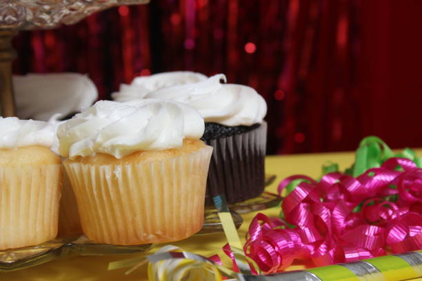 Cupcakes With White Icing on Table at Party Event