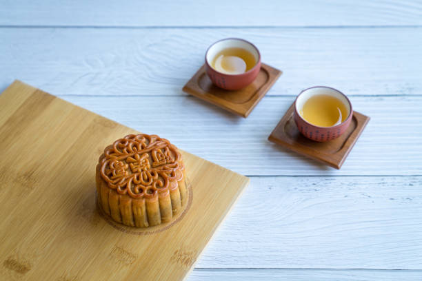 istock Moon cake served with chinese tea. 1488472706