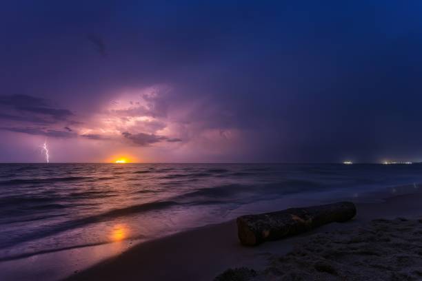 istock thunderstorm with lightning on the sea night 1488472925