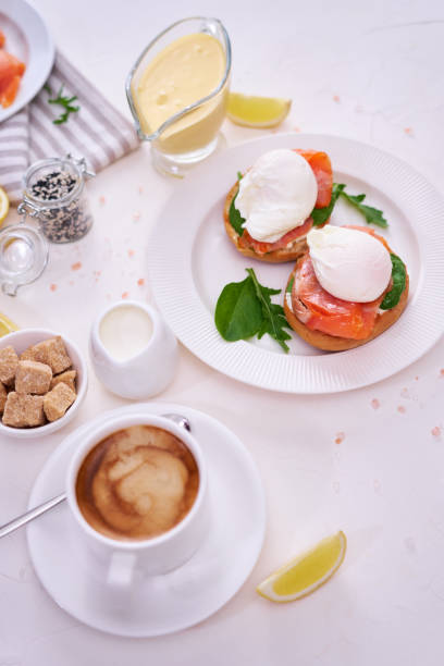 istock Cream cheese, Smoked salmon and poached egg toasts on a plate 1488475877