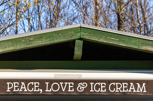 Copenhagen, Denmark A sign on a kiosk says Peace Love and Ice Cream.