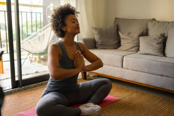 istock Doing exercises and stretching at home 1488479473