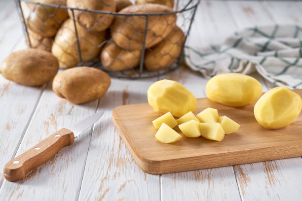 istock Raw yellow organic potatoes ready to cook. 1488481320