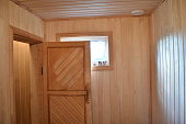 interior of a small house Finnish wooden sauna, steam room