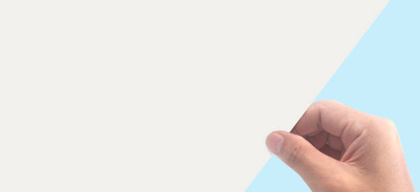 istock Hands holding paper blank for  letter paper 1488491366