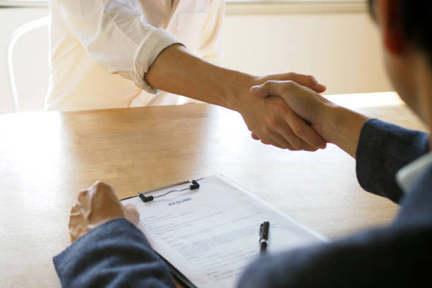 istock Executives accept job application documents and read job applicants resume to match the position. company publishes vacancies online to find human. Human resource, interview, letters, competence. 1488496083