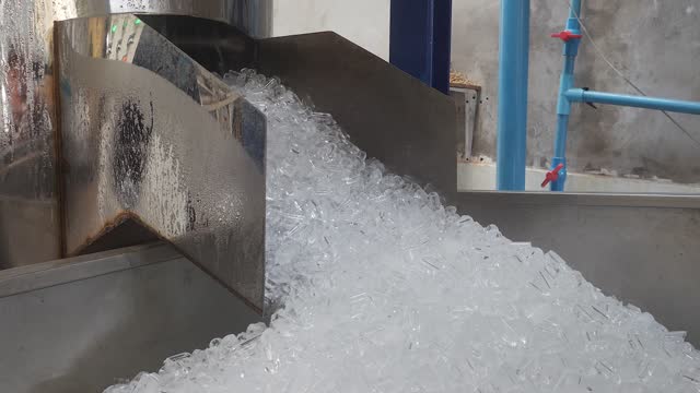 close up of a machine making small cube ice for coffee only