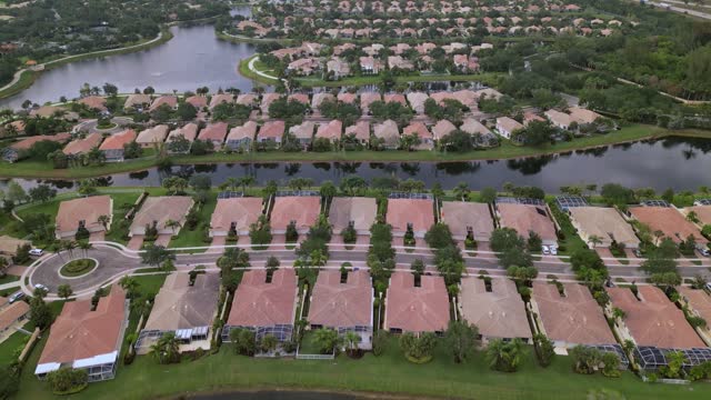 aerial view of neighborhood in Florida. residential houses. mansions and river