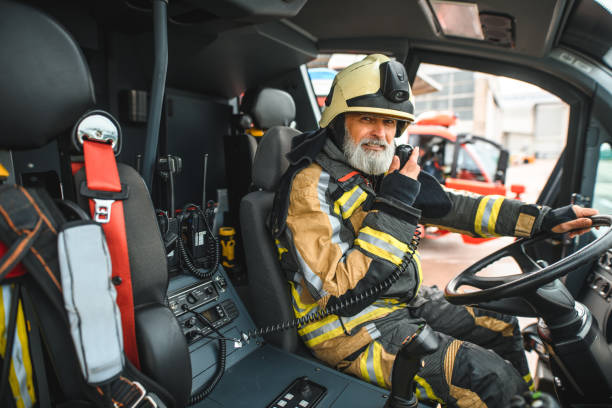 istock Senior Caucasian Firefighter Talking On The Radio 1488507005