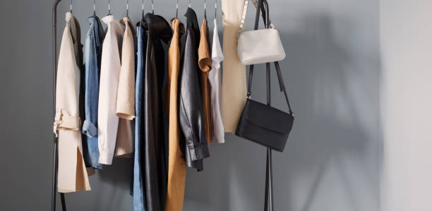 istock basic women's autumn wardrobe with shoes and handbags on  hanger 1488507564