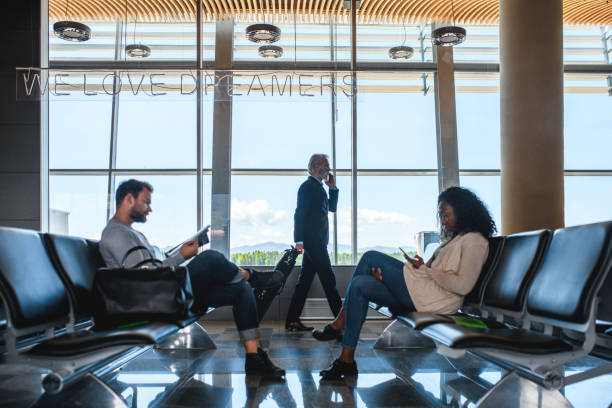 istock Waiting Crowd at an International Airport 1488507886