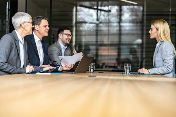 istock Female candidate having a job interview in the office. 1488516861