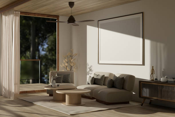 istock Minimal Scandinavian living room with couch, coffee table, ceiling fan, frame mockup on wall 1488517209