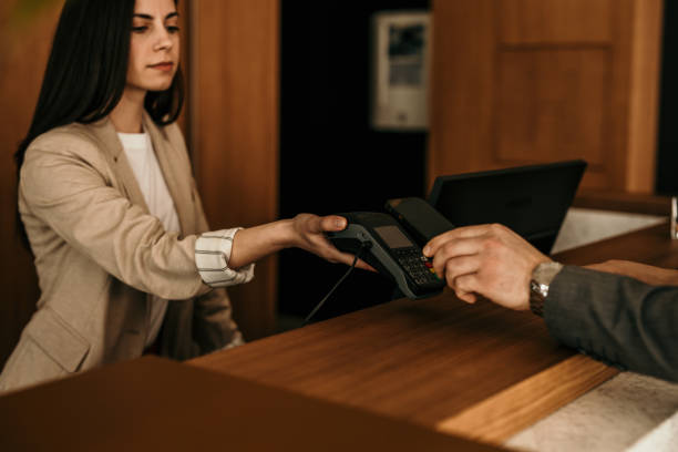 istock Contactless card payment at hotel 1488519714