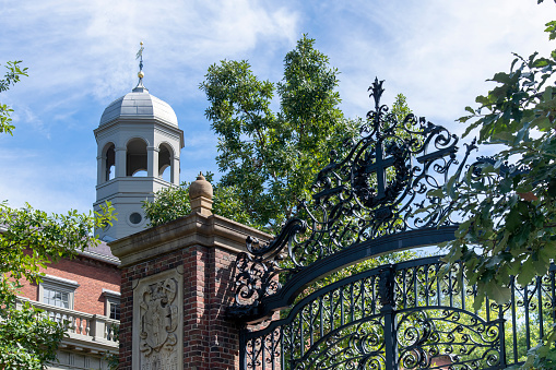 The Old Main building at sunny day on the campus of Penn State University on March 7, 2023 in State College, Pennsylvania, USA.