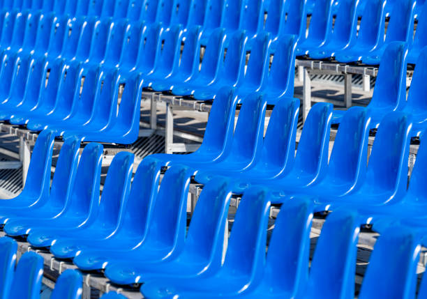 istock Full Frame Shot Of Empty Blue Seats At Stadium 1488524148