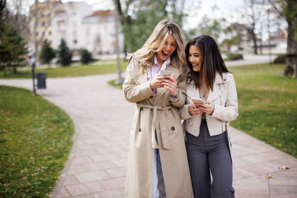 istock Girlfriends having fun outdoors 1488524176