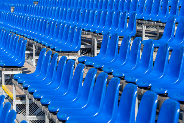 istock Full Frame Shot Of Empty Blue Seats At Stadium 1488524202