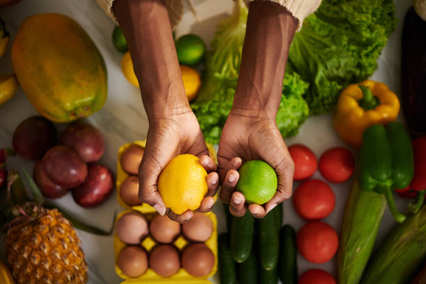 istock Woman Holding Juicy Lime and Lemon 1488526280