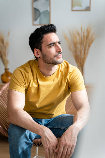 istock Man enjoying a quiet afternoon at home. 1488527979