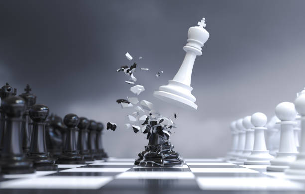 istock The white chess king crashed into the black chess king 1488528625