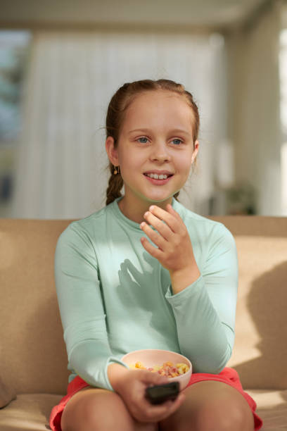 istock Girl Eating Sweet Snacks 1488529713