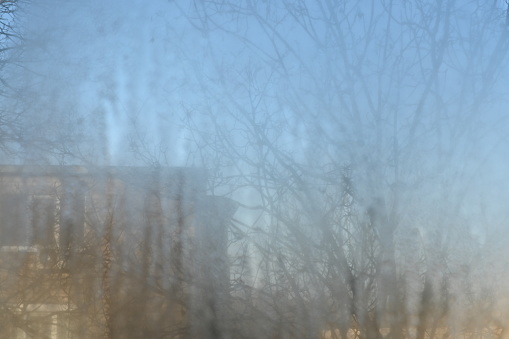 condensation on the glass with a blurred background outside the window