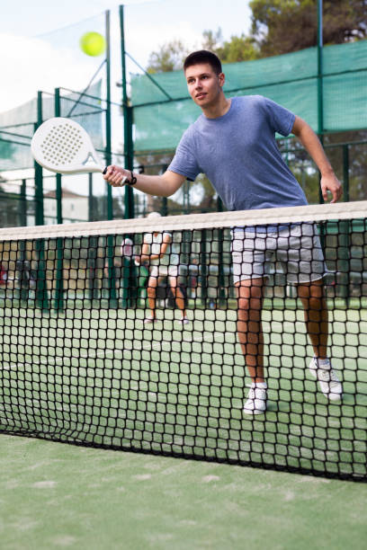 istock Boy padel tennis player training on court 1488533225