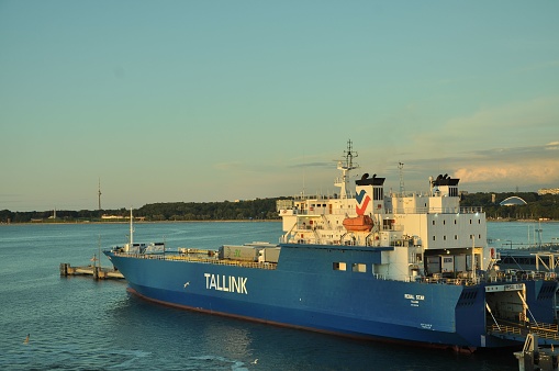Tallinn, Estonia – August 04, 2022: A large blue industrial Tallink ship on the body of water