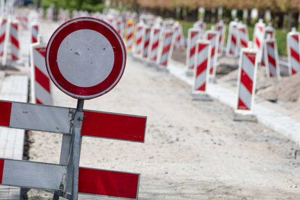 istock Road closed sign because of road reconstruction 1488534833