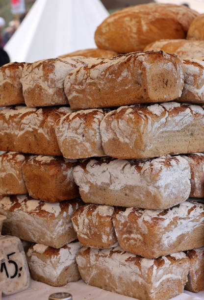 istock Freshly baked traditional bread at a street stall 1488537721