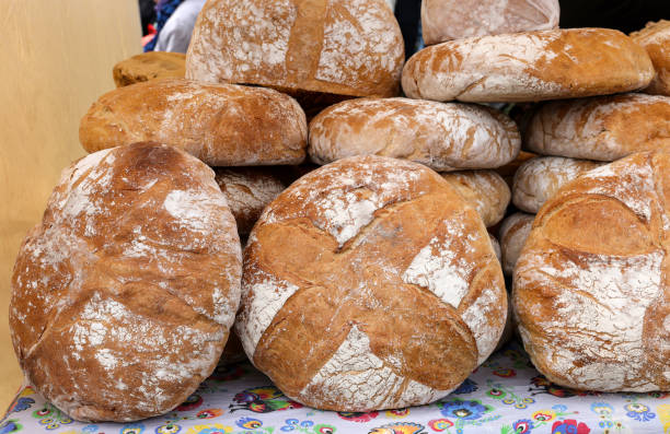 istock Freshly baked traditional bread at a street stall 1488537733